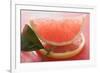 Wedge of Pink Grapefruit on Slice of Grapefruit with Leaf-Foodcollection-Framed Photographic Print