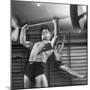 Weightlifter Charlie Morris at Southtown YMCA Working Out While Bob Byerwalter Works on Stall Bar-Ralph Crane-Mounted Photographic Print