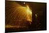 Welder's Torch Has Sparks Fly on Locomotive Factory Floor-null-Mounted Art Print