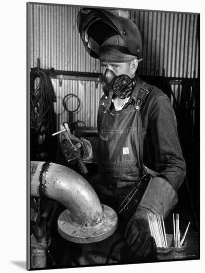 Welder Working in the Shipbuilding Industry-George Strock-Mounted Photographic Print