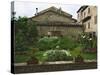 Well and Garden Courtyard, Buonconvento, Italy-Dennis Flaherty-Stretched Canvas