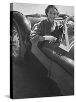 Well Dressed Woman Behind the Wheel of a Foreign Made Roadster-Nina Leen-Stretched Canvas