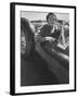 Well Dressed Woman Behind the Wheel of a Foreign Made Roadster-Nina Leen-Framed Photographic Print