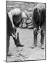 Welsh Blacksmith at Work Filing a Horse's Hoof on a Farm in Carnarvonshire-null-Mounted Photographic Print