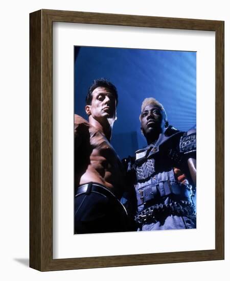 WESLEY SNIPES; SYLVESTER STALLONE. "Demolition Man" [1993], directed by MARCO BRAMBILLA.-null-Framed Photographic Print