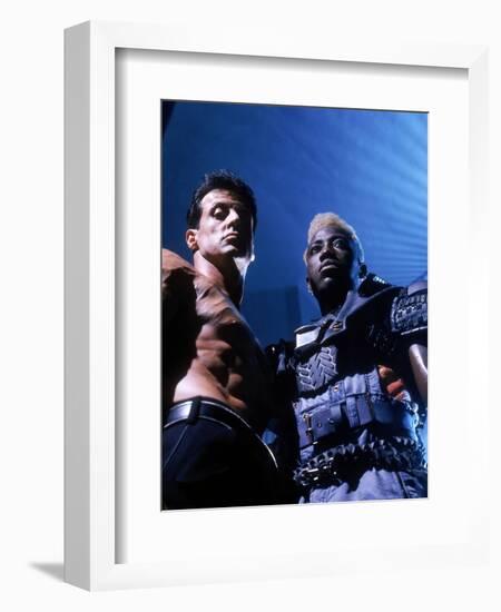 WESLEY SNIPES; SYLVESTER STALLONE. "Demolition Man" [1993], directed by MARCO BRAMBILLA.-null-Framed Photographic Print