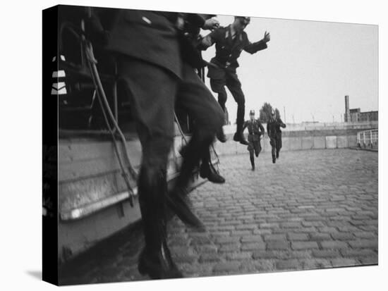 West Berlin Police Officers Jump from Truck as Two Others Come Running to Start Guard Duty-Paul Schutzer-Stretched Canvas