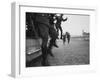 West Berlin Police Officers Jump from Truck as Two Others Come Running to Start Guard Duty-Paul Schutzer-Framed Photographic Print