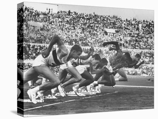 West Germany's Armin Harry, Winner of Men's 100 Meter Dash at Start of Event in Summer Olympics-George Silk-Stretched Canvas