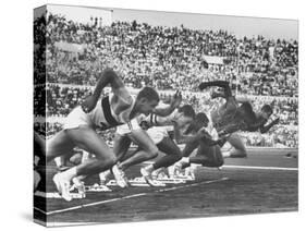 West Germany's Armin Harry, Winner of Men's 100 Meter Dash at Start of Event in Summer Olympics-George Silk-Stretched Canvas