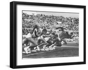 West Germany's Armin Harry, Winner of Men's 100 Meter Dash at Start of Event in Summer Olympics-George Silk-Framed Premium Photographic Print