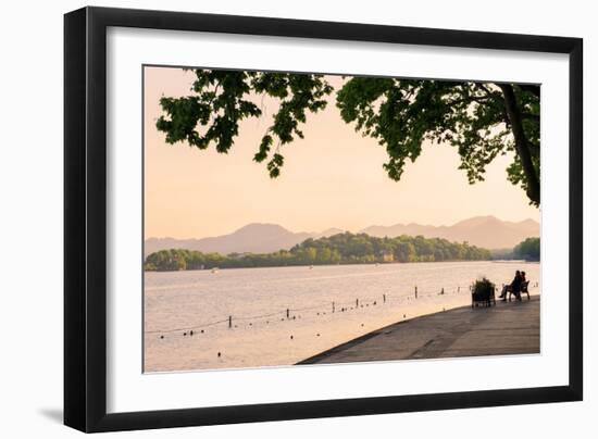 West Lake Shore with Hilly Landscape and Silhouettes, Hangzhou, Zhejiang, China, Asia-Andreas Brandl-Framed Photographic Print