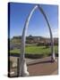 Whalebone Arch on Seafront, with Whitby Abbey Ruin in Distance, Whitby, Yorkshire-Neale Clarke-Stretched Canvas