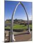 Whalebone Arch on Seafront, with Whitby Abbey Ruin in Distance, Whitby, Yorkshire-Neale Clarke-Mounted Photographic Print