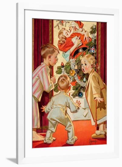 What Is Santa Doing to Mommy?-Joseph Christian Leyendecker-Framed Art Print