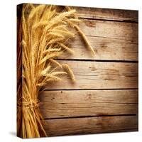 Wheat Ears on the Wooden Table, Sheaf of Wheat over Wood Background-Subbotina Anna-Stretched Canvas