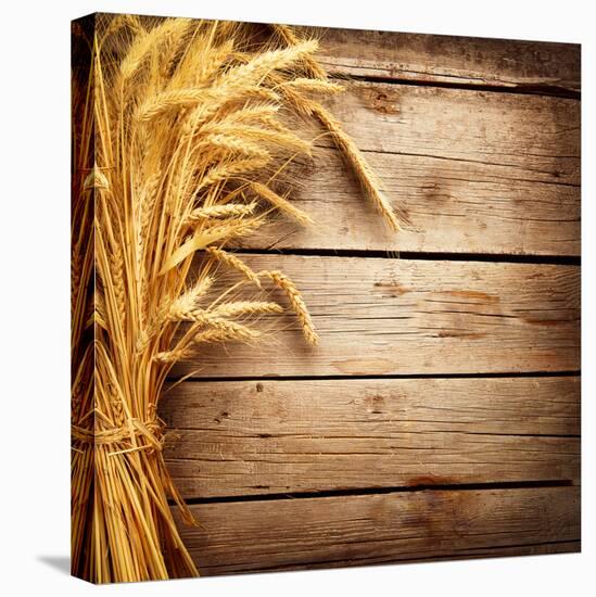 Wheat Ears on the Wooden Table, Sheaf of Wheat over Wood Background-Subbotina Anna-Stretched Canvas