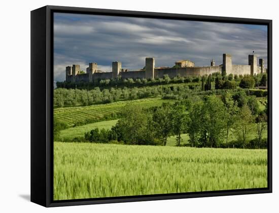 Wheat field and distant Monteriggioni, Siena, Tuscany, Italy-Adam Jones-Framed Stretched Canvas