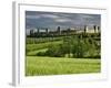 Wheat field and distant Monteriggioni, Siena, Tuscany, Italy-Adam Jones-Framed Photographic Print