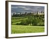 Wheat field and distant Monteriggioni, Siena, Tuscany, Italy-Adam Jones-Framed Photographic Print