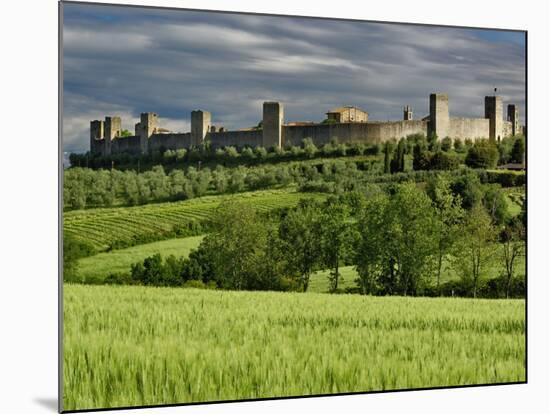 Wheat field and distant Monteriggioni, Siena, Tuscany, Italy-Adam Jones-Mounted Photographic Print