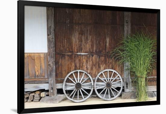 Wheel with Gassho-zukuri house, Ainokura Village, Gokayama, Japan-Keren Su-Framed Photographic Print