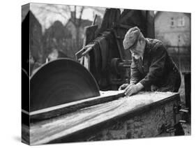 Wheelwright Working with a Circular Saw, February 1935-null-Stretched Canvas