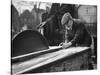 Wheelwright Working with a Circular Saw, February 1935-null-Stretched Canvas
