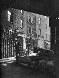 Fruit Baskets Piled Against Houses at Borough Market, London, 1926-1927-Whiffin-Giclee Print