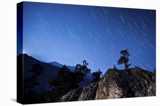 Whisps of Moonlight Shine Through the Mountain Peaks of Inyo National Forest-null-Stretched Canvas