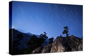 Whisps of Moonlight Shine Through the Mountain Peaks of Inyo National Forest-null-Stretched Canvas