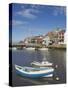 Whitby Church and Fishing Boats in the Harbour, Whitby, North Yorkshire, Yorkshire, England, UK-Neale Clarke-Stretched Canvas