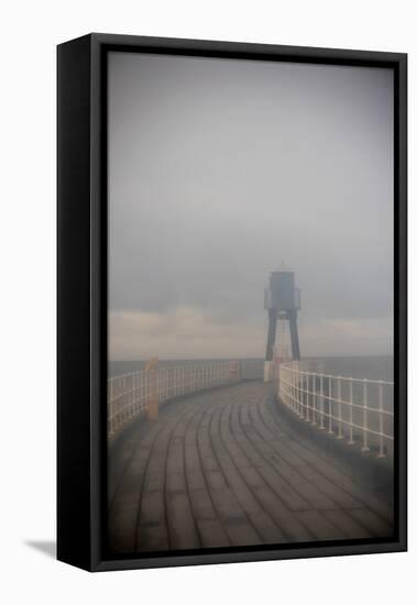 Whitby Harbour West Lighthouse in Mist  2020  (photograph)-Ant Smith-Framed Stretched Canvas