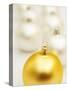 White Christmas tree decorations and a yellow one-null-Stretched Canvas