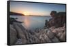 White cliffs and blue sea framed by the lights of sunset Santa Teresa di Gallura, Sardinia, Italy-Roberto Moiola-Framed Stretched Canvas