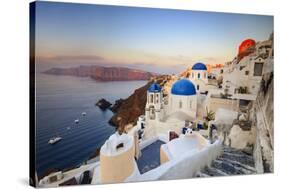 White Houses and Blue Domes of the Churches Dominate the Aegean Sea, Oia, Santorini-Roberto Moiola-Stretched Canvas