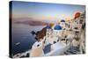 White Houses and Blue Domes of the Churches Dominate the Aegean Sea, Oia, Santorini-Roberto Moiola-Stretched Canvas