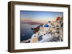 White Houses and Blue Domes of the Churches Dominate the Aegean Sea, Oia, Santorini-Roberto Moiola-Framed Photographic Print