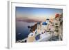 White Houses and Blue Domes of the Churches Dominate the Aegean Sea, Oia, Santorini-Roberto Moiola-Framed Photographic Print
