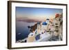 White Houses and Blue Domes of the Churches Dominate the Aegean Sea, Oia, Santorini-Roberto Moiola-Framed Photographic Print