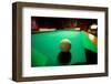 White pool ball lit by electric lights in a restaurant and bar in Shoshone, CA near Death Valley...-null-Framed Photographic Print