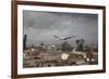 White Stork (Ciconia Ciconia) in Flight over City Buildings. Marakesh, Morocco, March-Ernie Janes-Framed Photographic Print