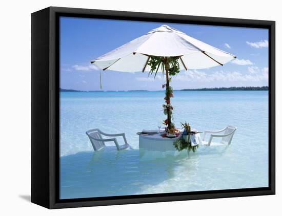 White Table, Chairs and Parasol in the Ocean, Bora Bora (Borabora), Society Islands-Mark Mawson-Framed Stretched Canvas