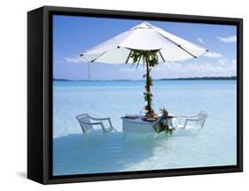 White Table, Chairs and Parasol in the Ocean, Bora Bora (Borabora), Society Islands-Mark Mawson-Framed Stretched Canvas