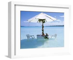 White Table, Chairs and Parasol in the Ocean, Bora Bora (Borabora), Society Islands-Mark Mawson-Framed Photographic Print
