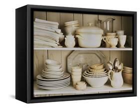 White Tableware and Table Cloths on a Kitchen Shelf-Ellen Silverman-Framed Stretched Canvas