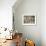 White Tableware and Table Cloths on a Kitchen Shelf-Ellen Silverman-Framed Photographic Print displayed on a wall