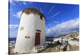 Whitewashed windmill, view of Mykonos Town (Chora) and cruise ships in distance, Mykonos, Cyclades,-Eleanor Scriven-Stretched Canvas