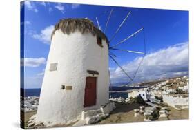 Whitewashed windmill, view of Mykonos Town (Chora) and cruise ships in distance, Mykonos, Cyclades,-Eleanor Scriven-Stretched Canvas