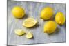 Whole and Sliced Lemons on Grey Subsoil-Jana Ihle-Mounted Photographic Print